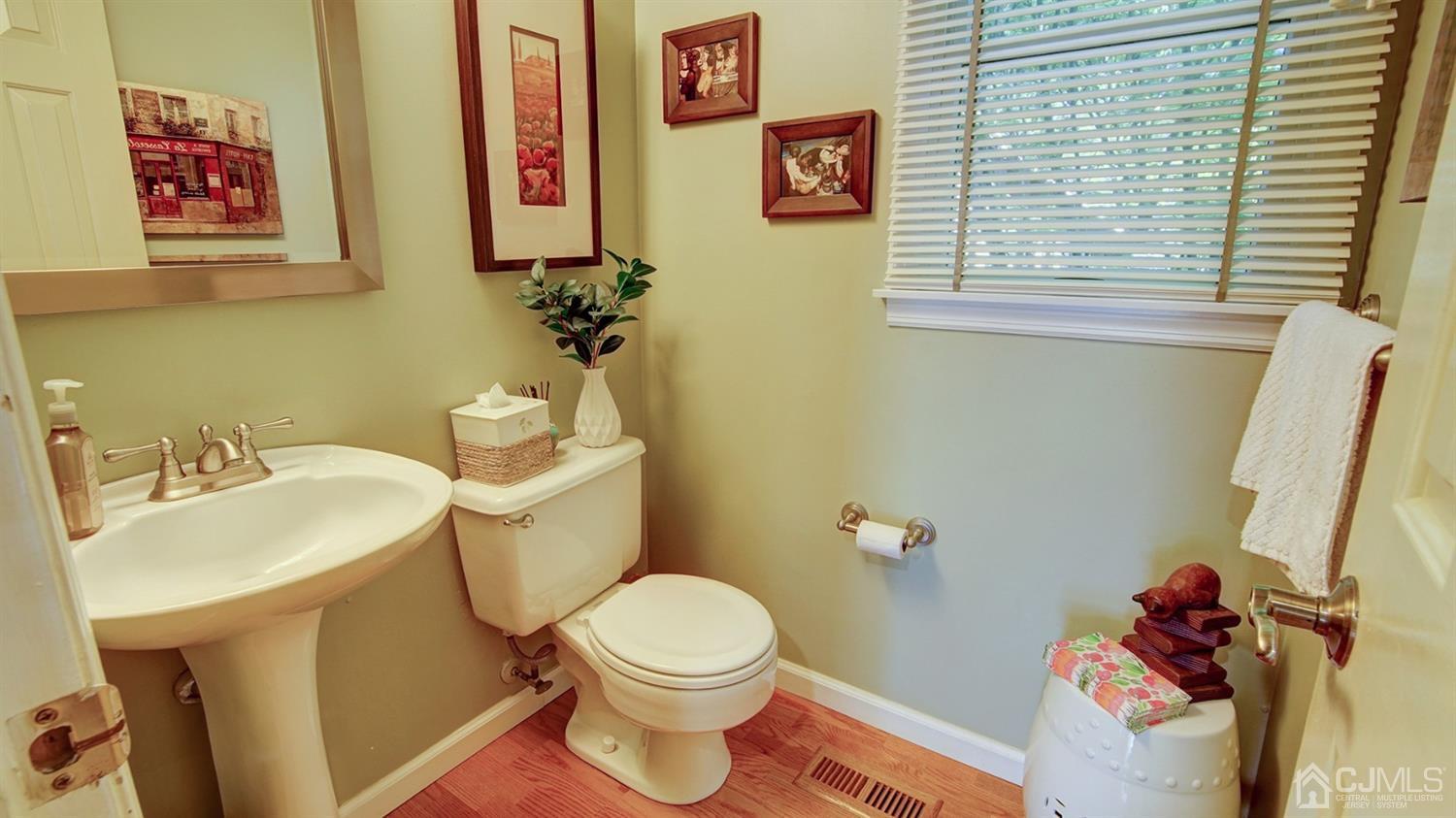 9 Tremblay Road East Brunswick, NJ 08816 - Photo 16 of 25 a bathroom with a sink and a toilet