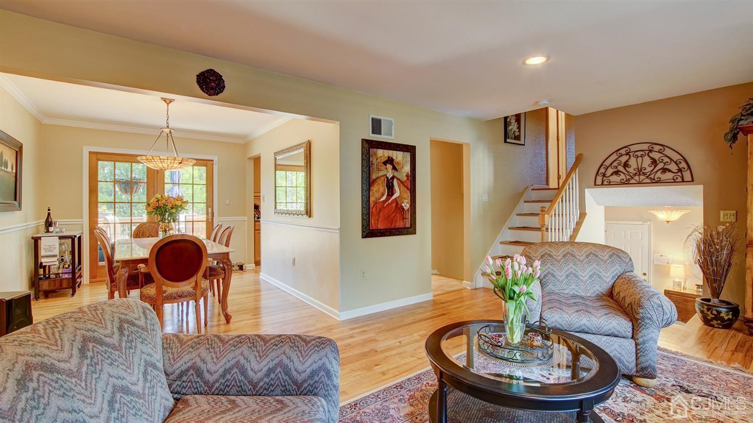 9 Tremblay Road East Brunswick, NJ 08816 - Photo 25 of 25 a living room with furniture and a potted plant
