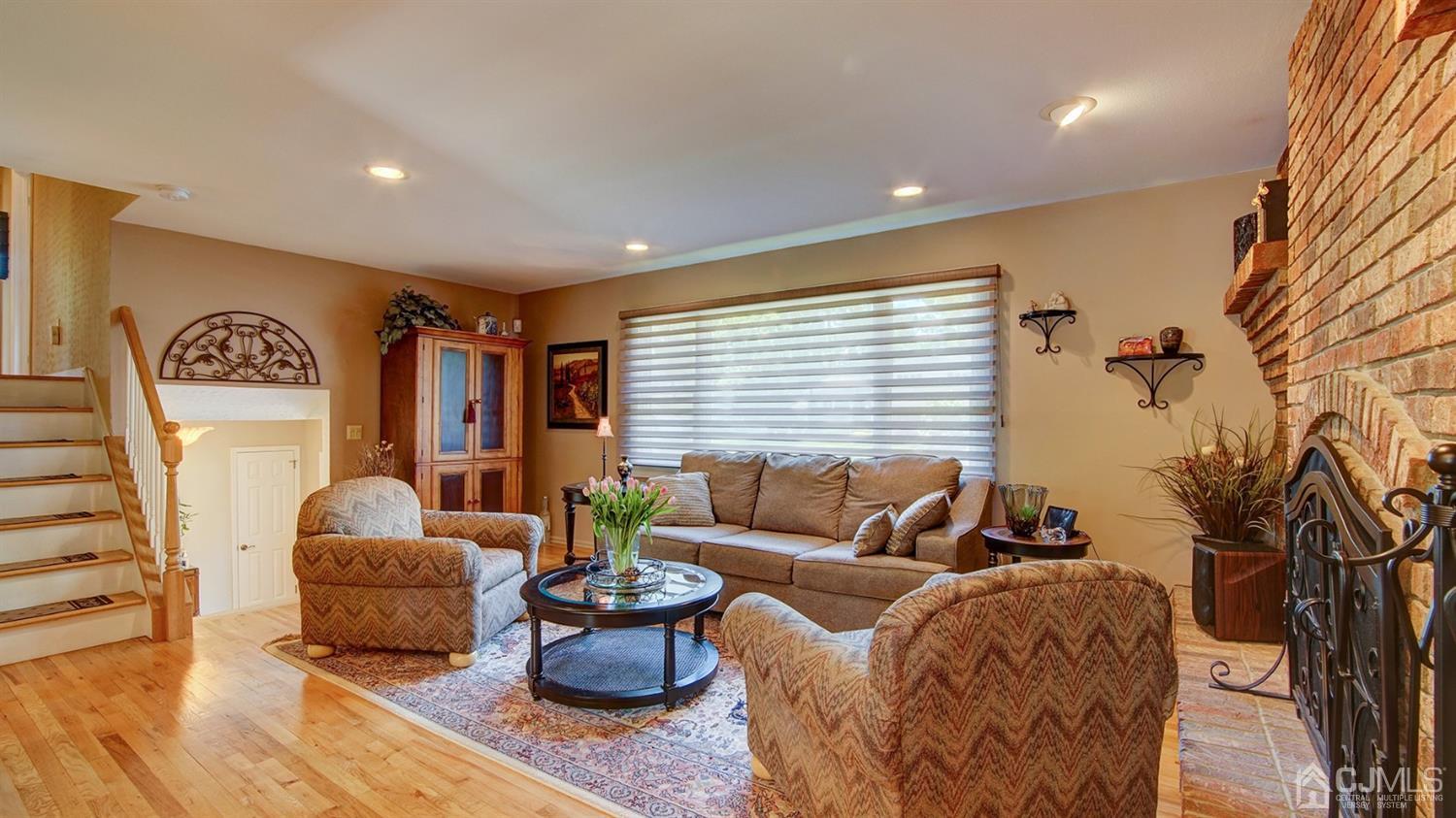 9 Tremblay Road East Brunswick, NJ 08816 - Photo 5 of 25 a living room with furniture and a potted plant