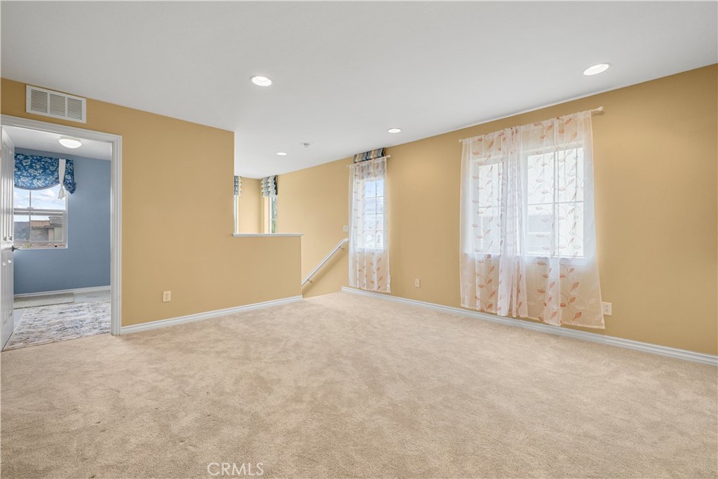 17408 Winter Pine Way Canyon Country, CA 91387 - Photo 20 of 29 a view of an empty room with a window