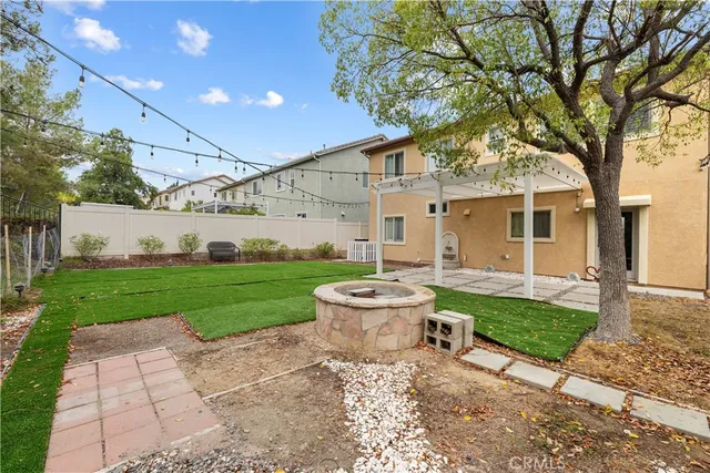 a view of a backyard with a patio