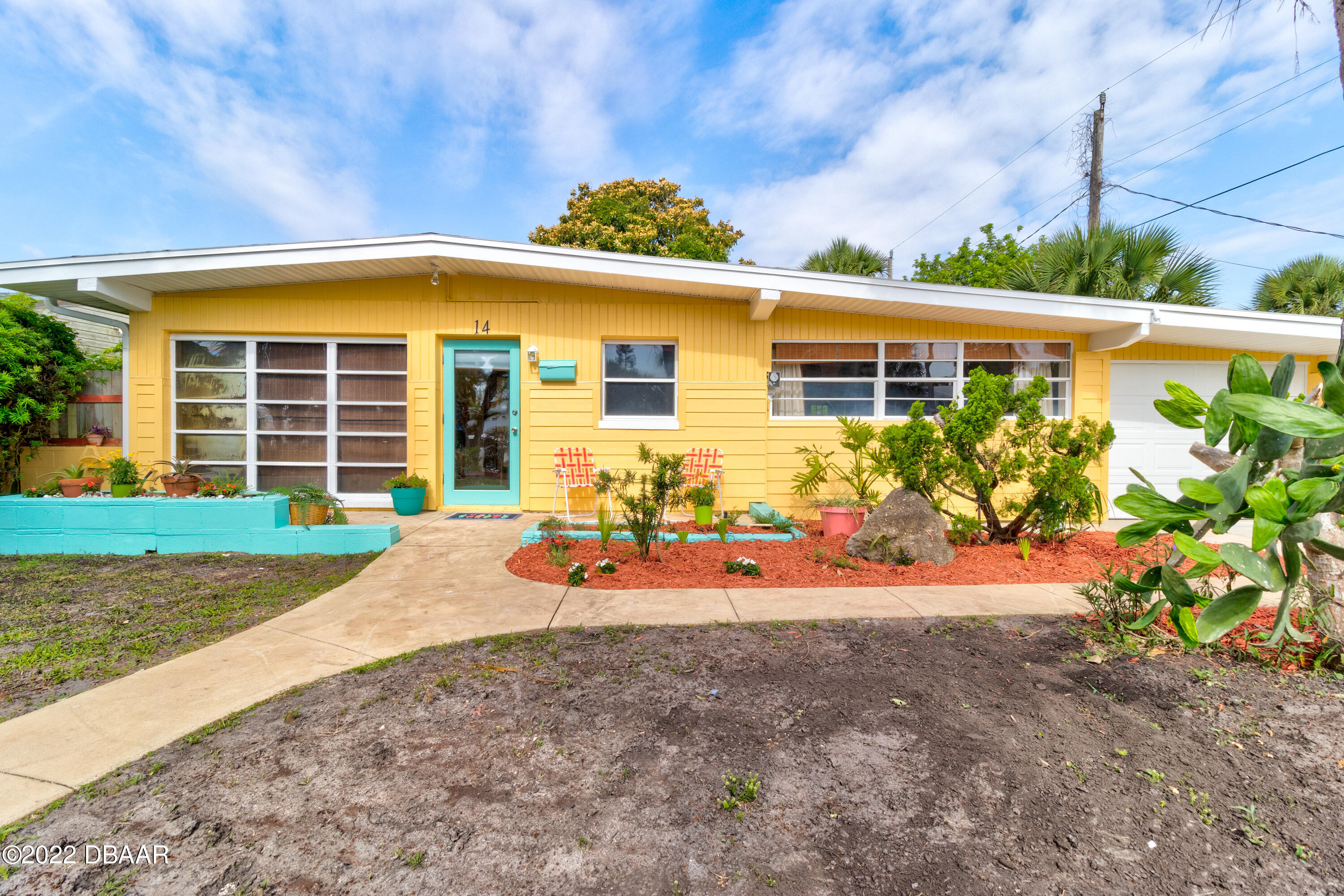 14 Maria Street Ormond Beach, FL 32176 - Photo 1 of 20 front view of a house with a yard