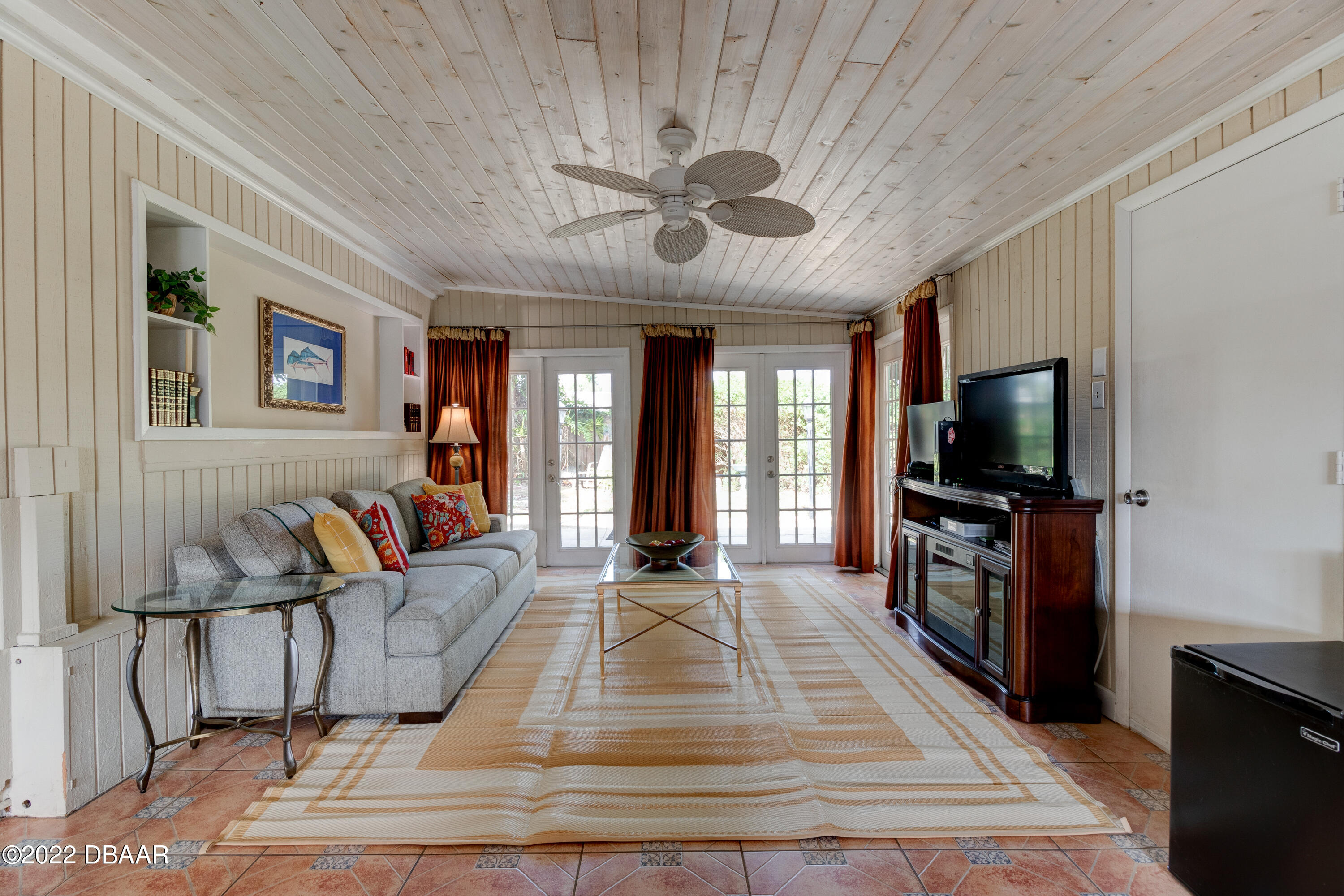 14 Maria Street Ormond Beach, FL 32176 - Photo 14 of 20 a living room with furniture and a flat screen tv