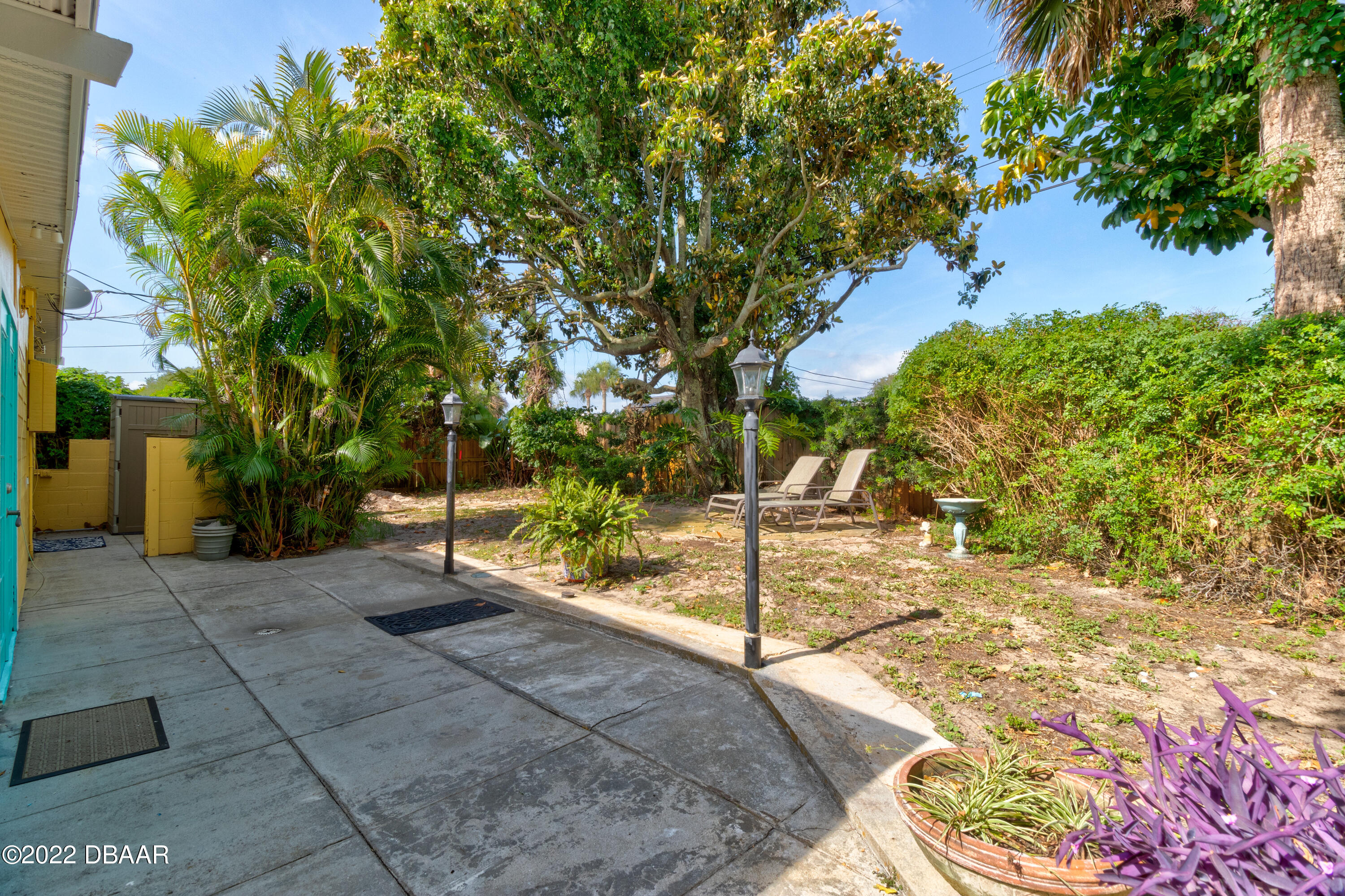 14 Maria Street Ormond Beach, FL 32176 - Photo 19 of 20 a view of a backyard