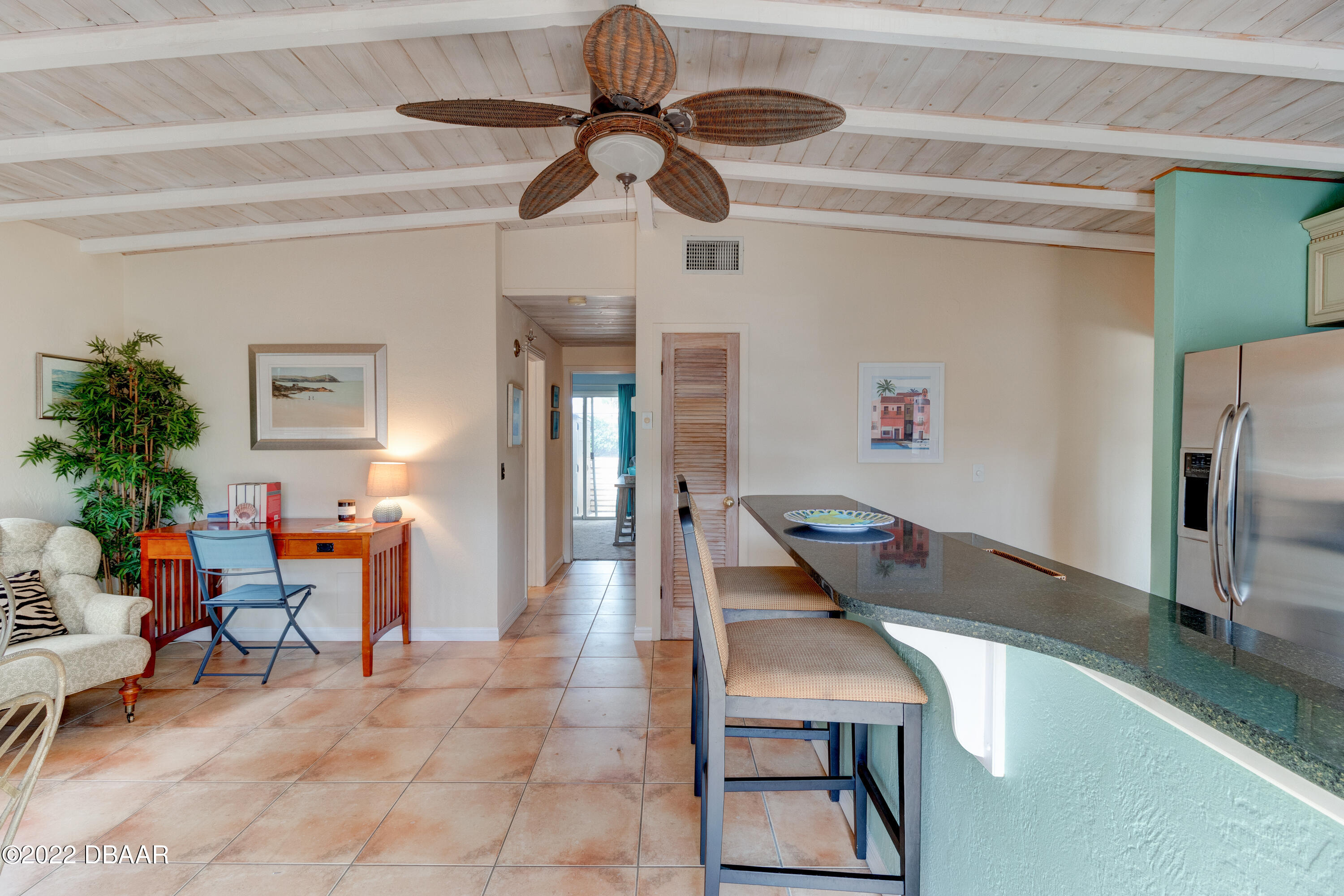 14 Maria Street Ormond Beach, FL 32176 - Photo 4 of 20 a living room with furniture and a flat screen tv