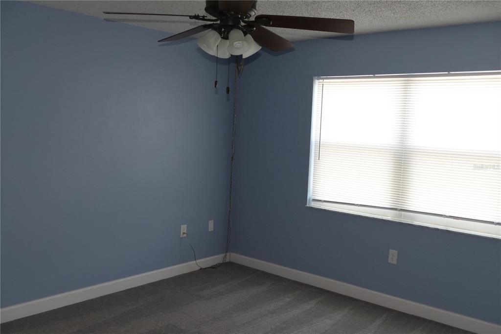 205 South McMullen Booth Road, Unit 203 Clearwater, FL 33759 - Photo 11 of 21 an empty room with a window