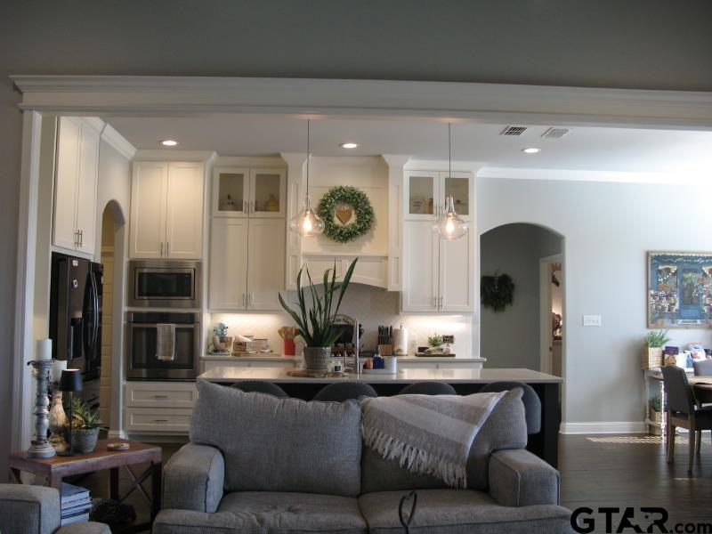 118 Nathan Road Chandler, TX 75758 - Photo 14 of 28 a living room with furniture and a fireplace