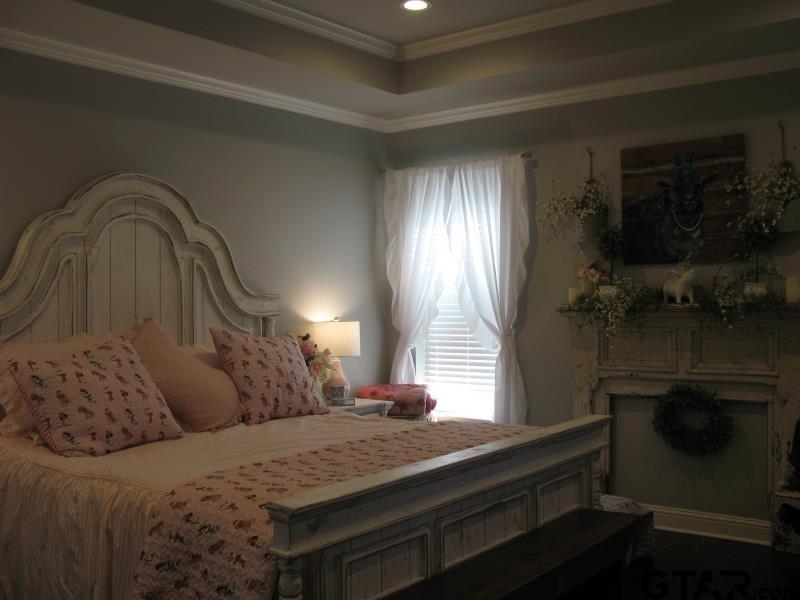 118 Nathan Road Chandler, TX 75758 - Photo 17 of 28 a bedroom with a bed and window