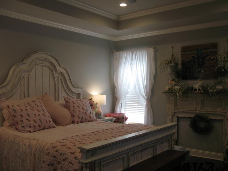 118 Nathan Road Chandler, TX 75758 - Photo 19 of 28 a bedroom with a bed and a window