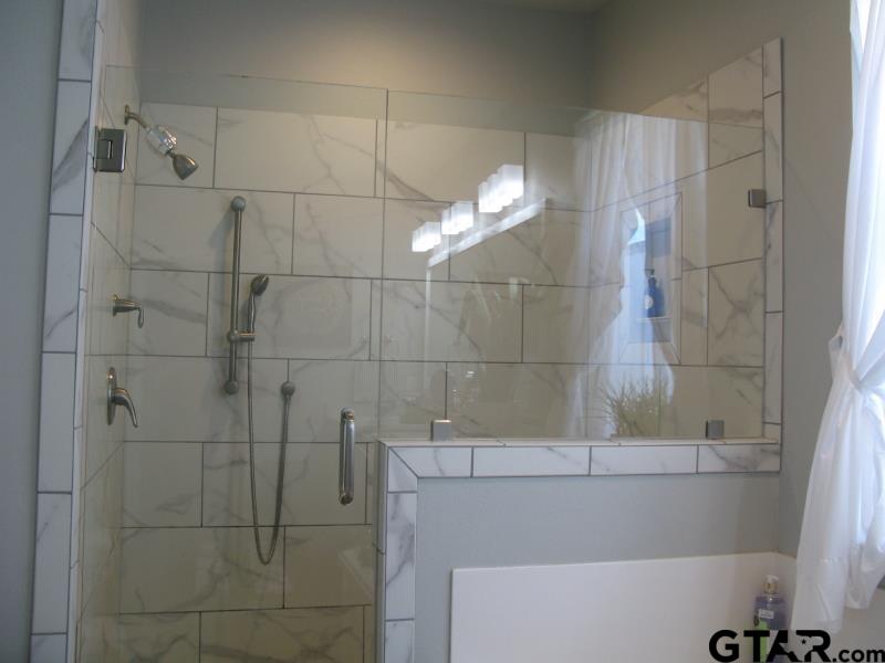 118 Nathan Road Chandler, TX 75758 - Photo 20 of 28 a bathroom with a shower