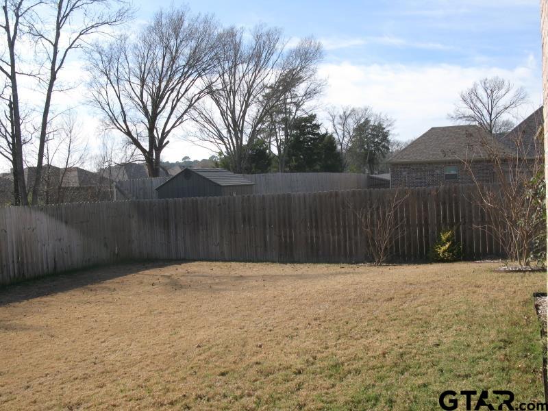 118 Nathan Road Chandler, TX 75758 - Photo 27 of 28 a backyard of a house
