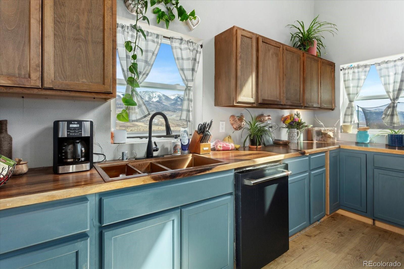 51624 Co Road Villa Grove, CO 81155 - Photo 12 of 50 a kitchen with sink and cabinets
