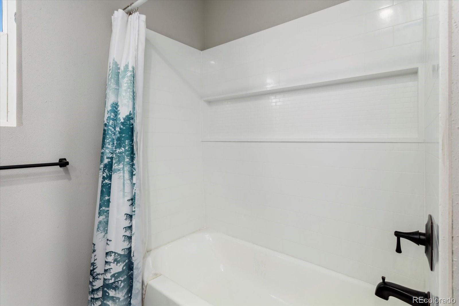51624 Co Road Villa Grove, CO 81155 - Photo 21 of 50 a bathroom with a bathtub