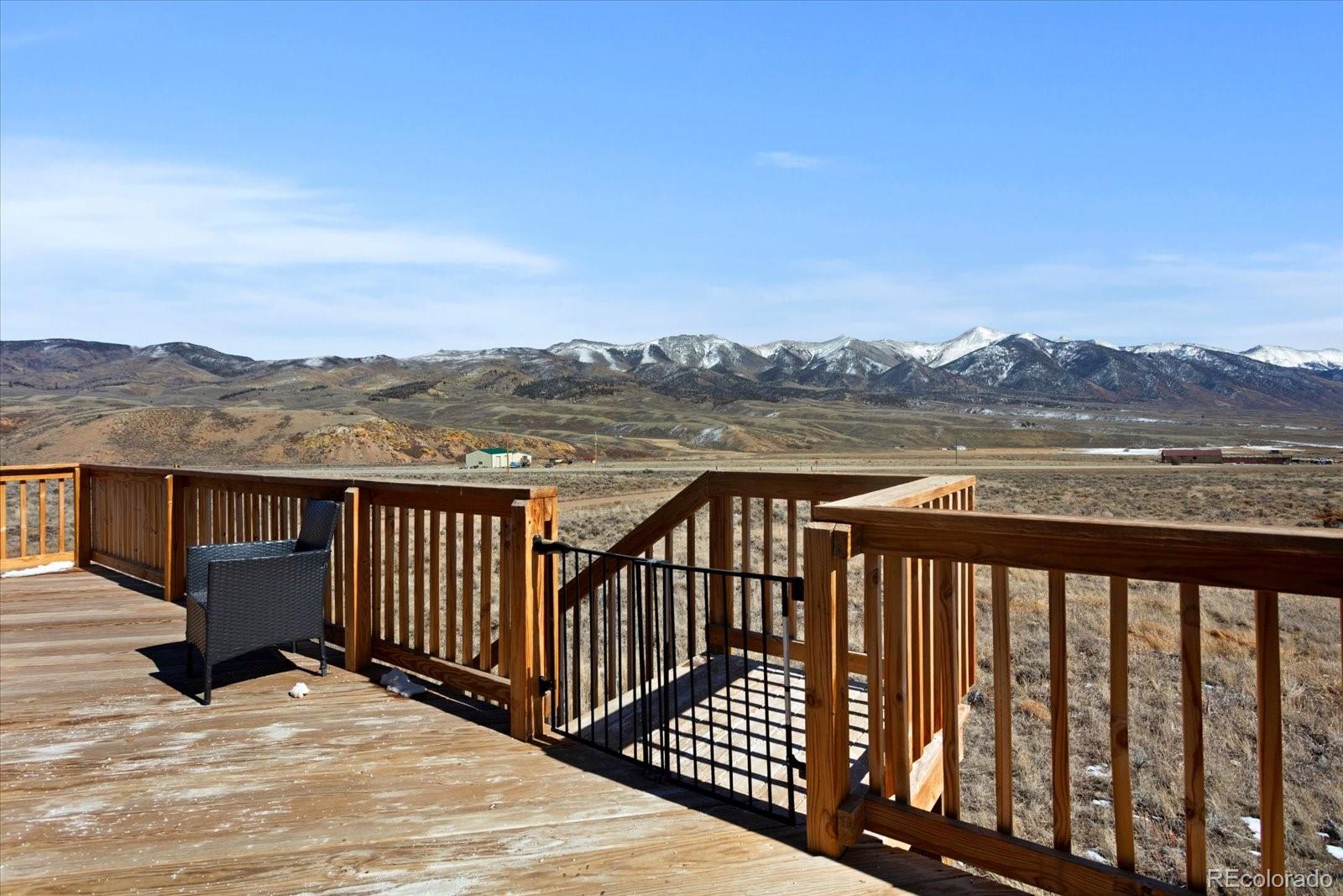 51624 Co Road Villa Grove, CO 81155 - Photo 38 of 50 a view of balcony with wooden floor and mountain view