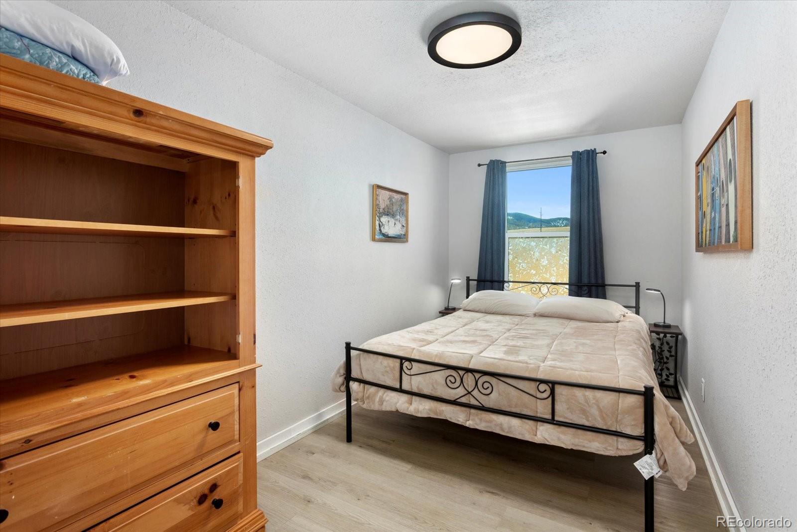 51624 Co Road Villa Grove, CO 81155 - Photo 43 of 50 a bedroom with a bed and a window