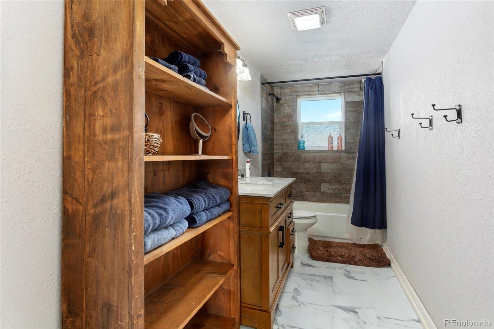 51624 Co Road Villa Grove, CO 81155 - Photo 44 of 50 a room with a door open to a room