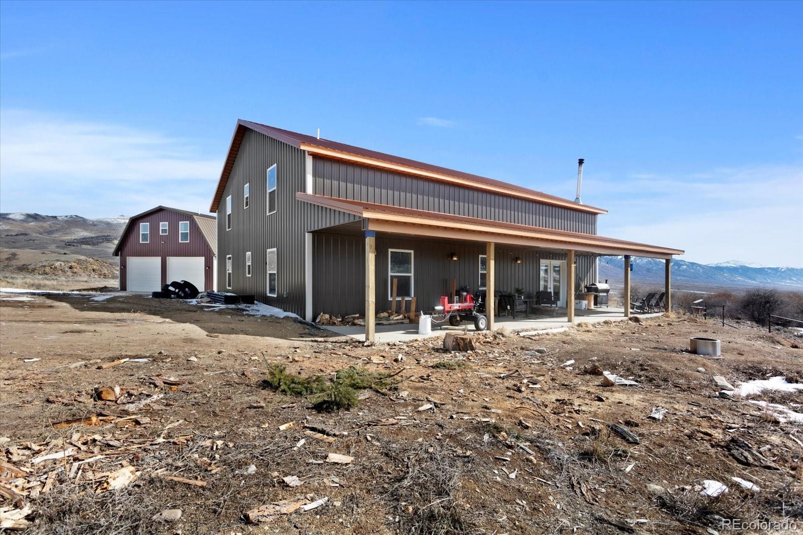 51624 Co Road Villa Grove, CO 81155 - Photo 48 of 50 a front view of a house with a garden