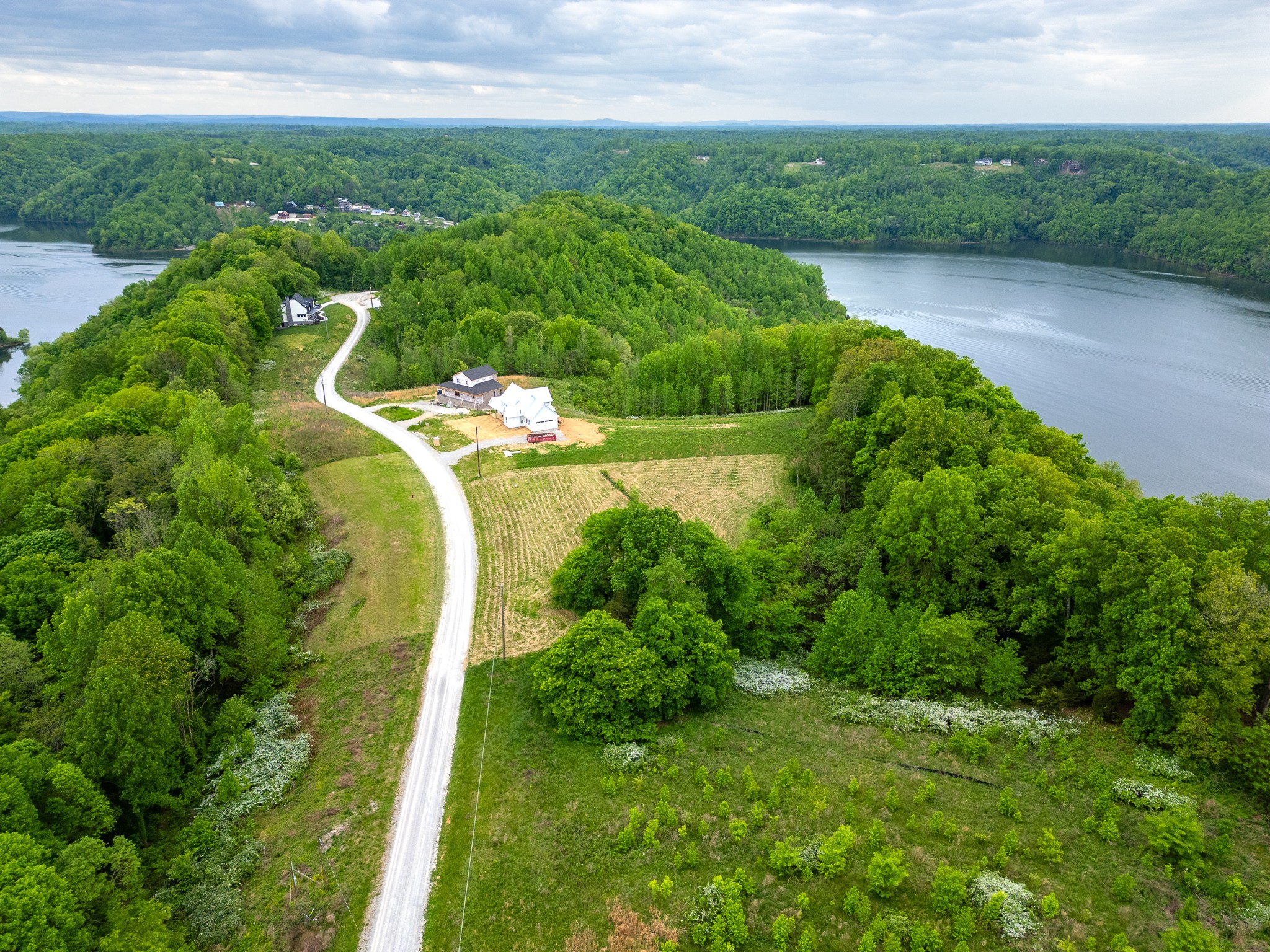 0 Lake Bluff Baxter, TN 38544 - Photo 13 of 23 a view of a water pond with green yard