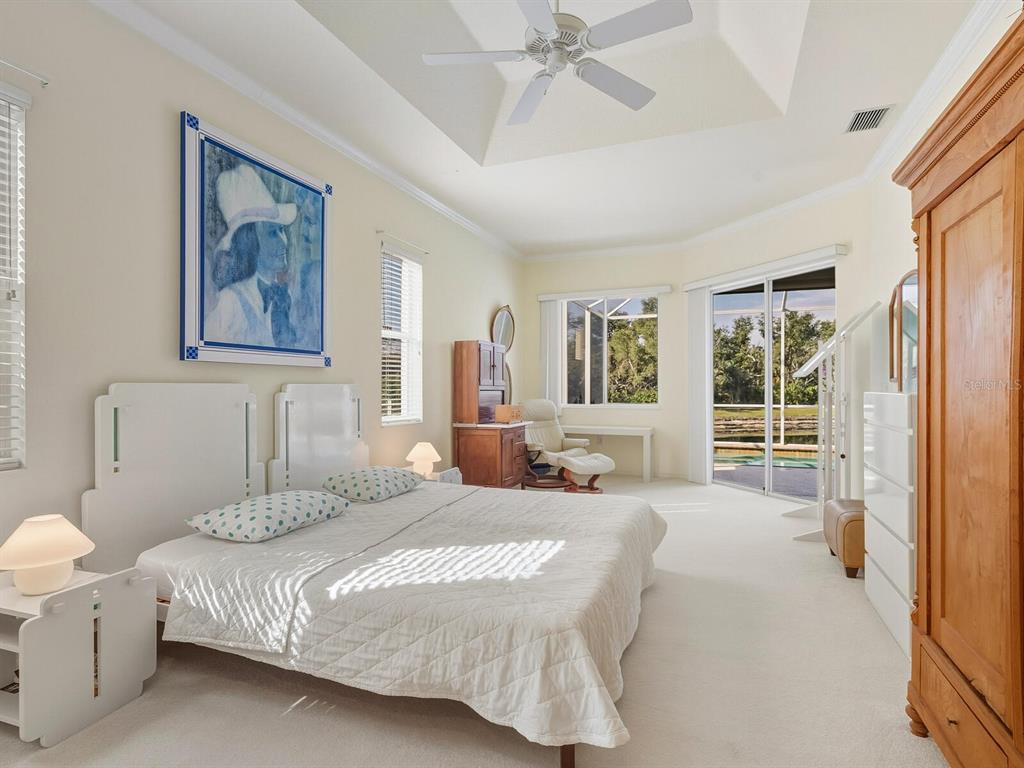 6524 Copper Ridge Trail University Park, FL 34201 - Photo 12 of 29 a bedroom with a bed and a window
