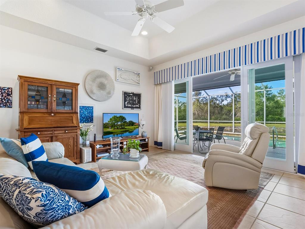 6524 Copper Ridge Trail University Park, FL 34201 - Photo 16 of 29 a living room with furniture and a large window
