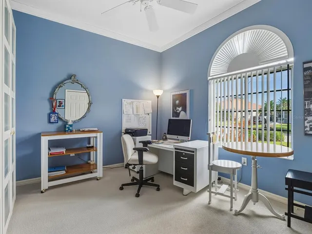 a view of a livingroom with furniture and a fireplace