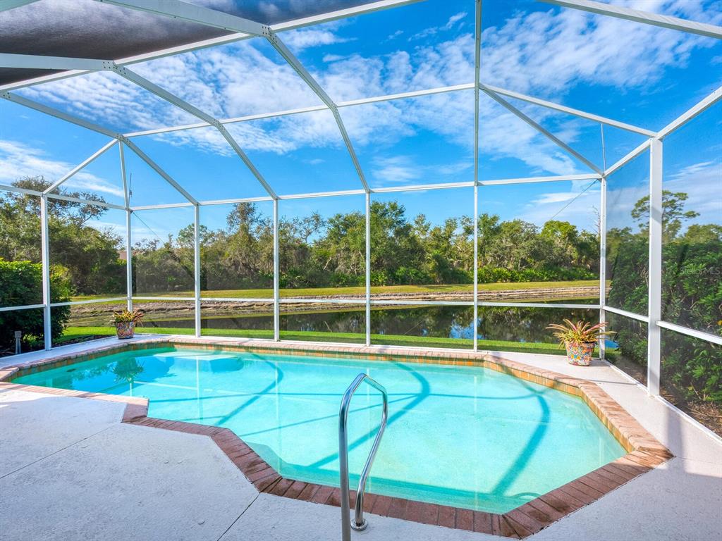 6524 Copper Ridge Trail University Park, FL 34201 - Photo 20 of 29 a view of a backyard with a swimming pool
