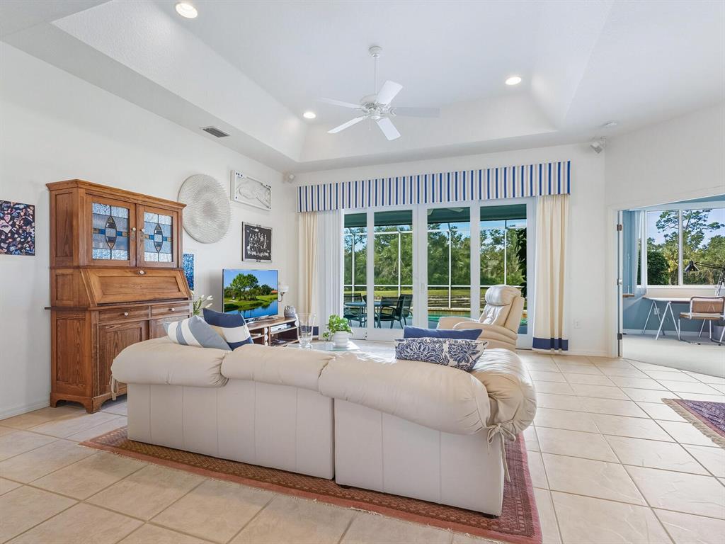 6524 Copper Ridge Trail University Park, FL 34201 - Photo 7 of 29 a living room with furniture and a large window