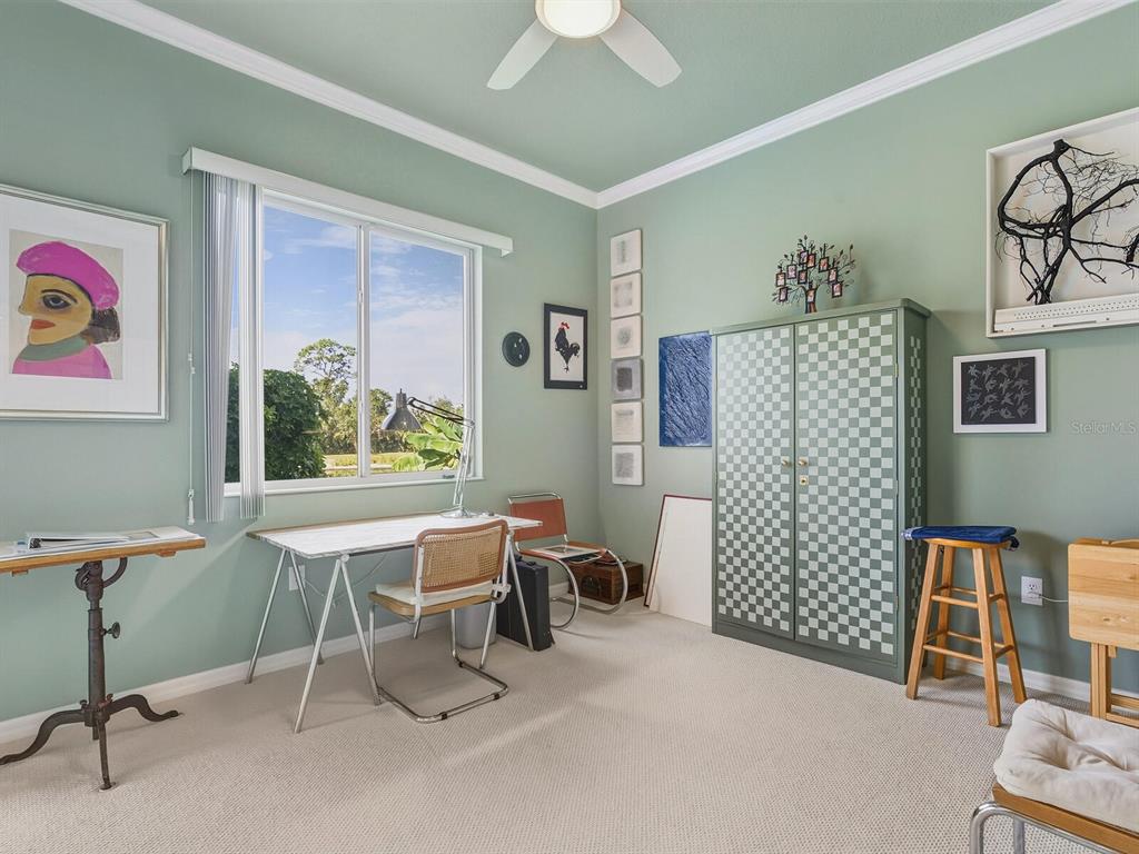 6524 Copper Ridge Trail University Park, FL 34201 - Photo 8 of 29 a view of a workspace with furniture and a window