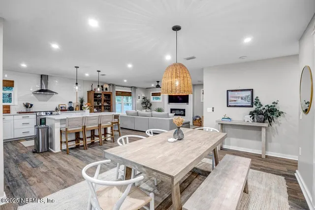 a potted plant sitting on top of a wooden floor with potted plant