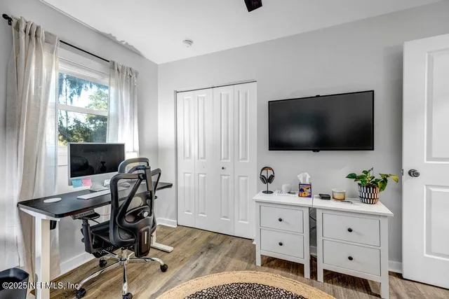 a living room with furniture and windows