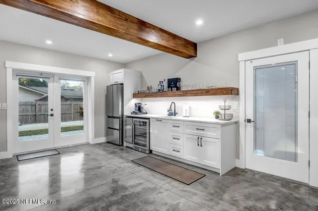 a house with a tree in front of it