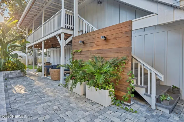 a view of a pathway with a patio