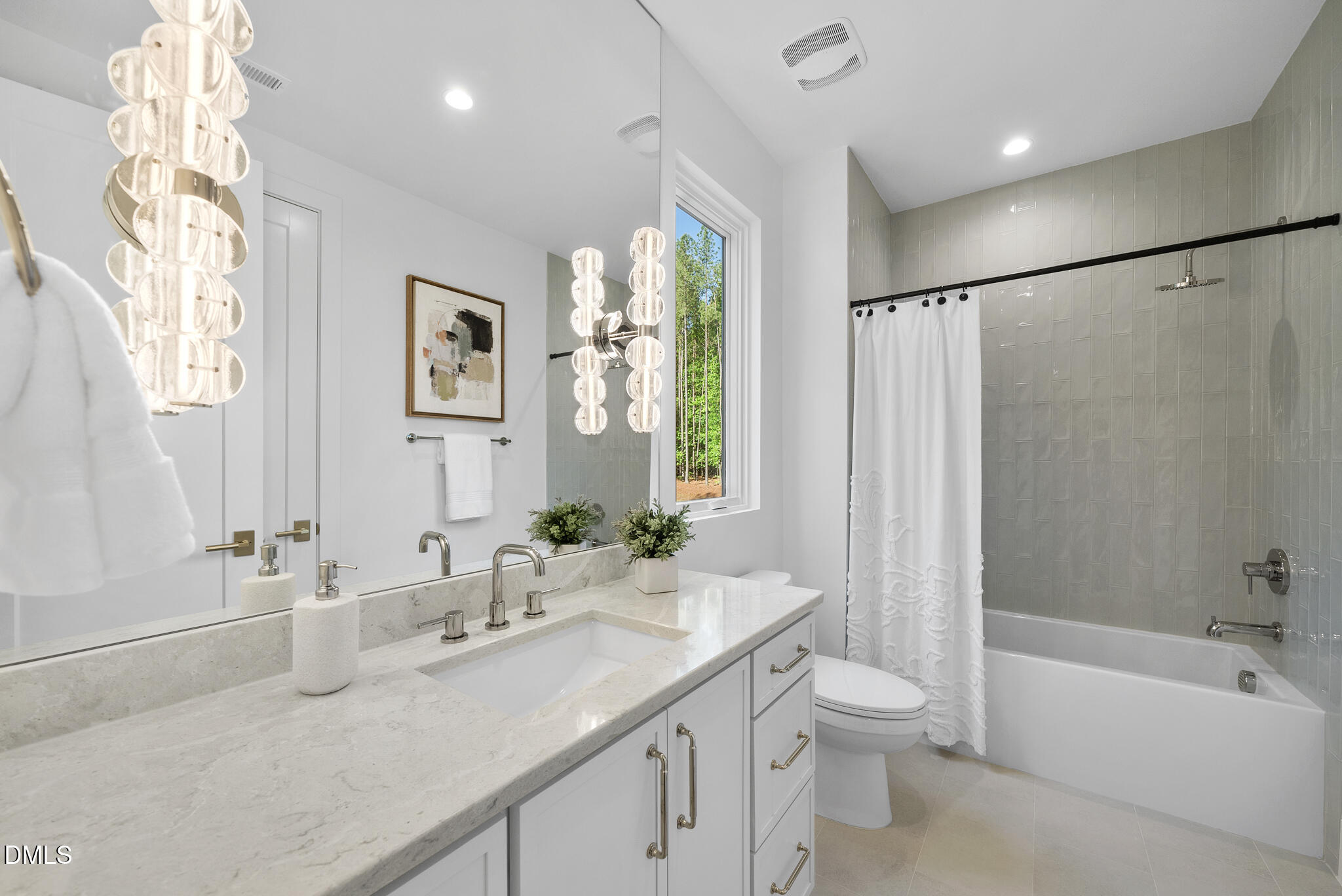 7608 Falls Creek Lane Raleigh, NC 27614 - Photo 59 of 74 a bathroom with a granite countertop sink a toilet a mirror a vanity and bathtub