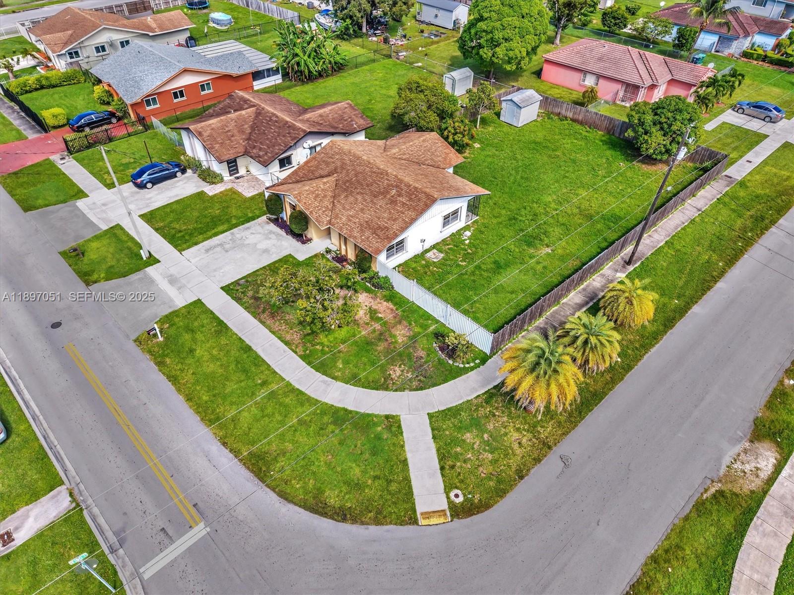 17995 Southwest 105th Avenue Miami, FL 33157 - Photo 15 of 45 an aerial view of a house