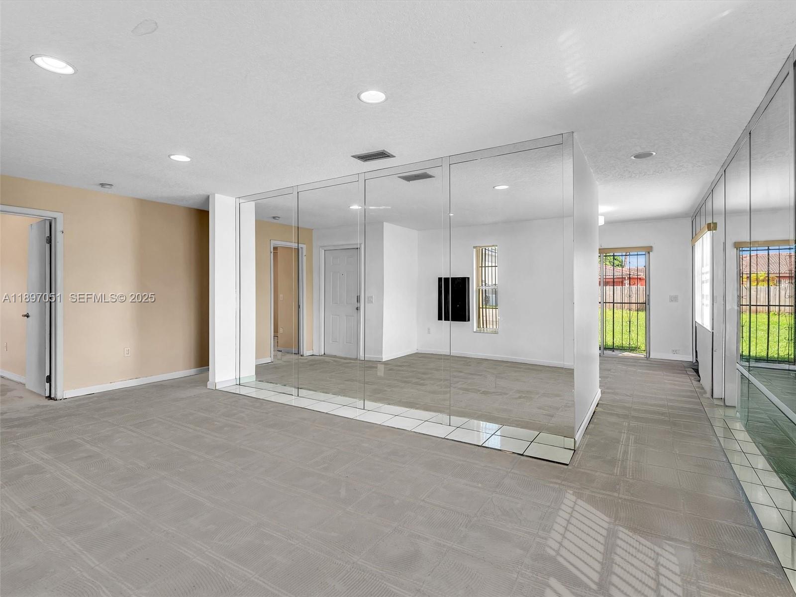 17995 Southwest 105th Avenue Miami, FL 33157 - Photo 4 of 45 a view of an empty room