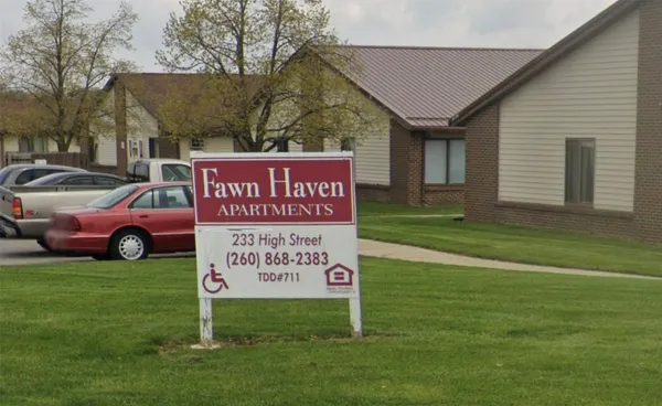 a view of a street sign on a road