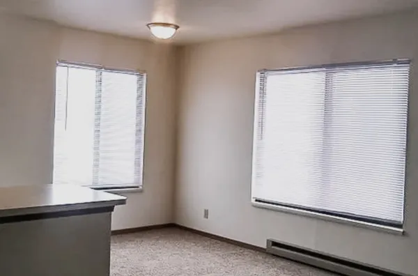 an empty room with window