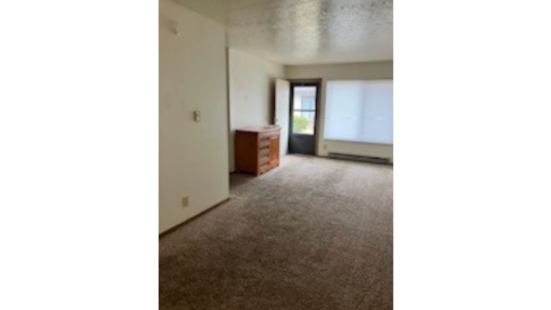 233 High Street Butler, IN 46721 - Photo 7 of 16 a view of a room with a hallway