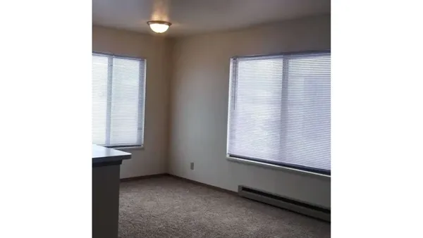 a view of an empty room with window