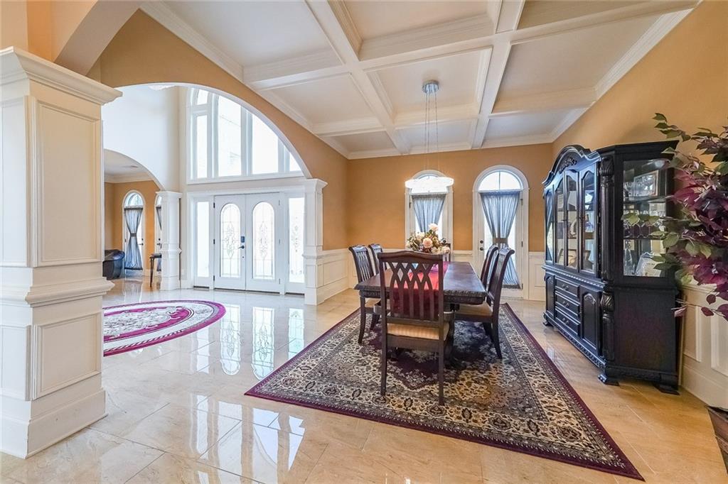 2425 Wild Oak Court Stockbridge, GA 30281 - Photo 12 of 39 a dining room with wooden floor and furniture