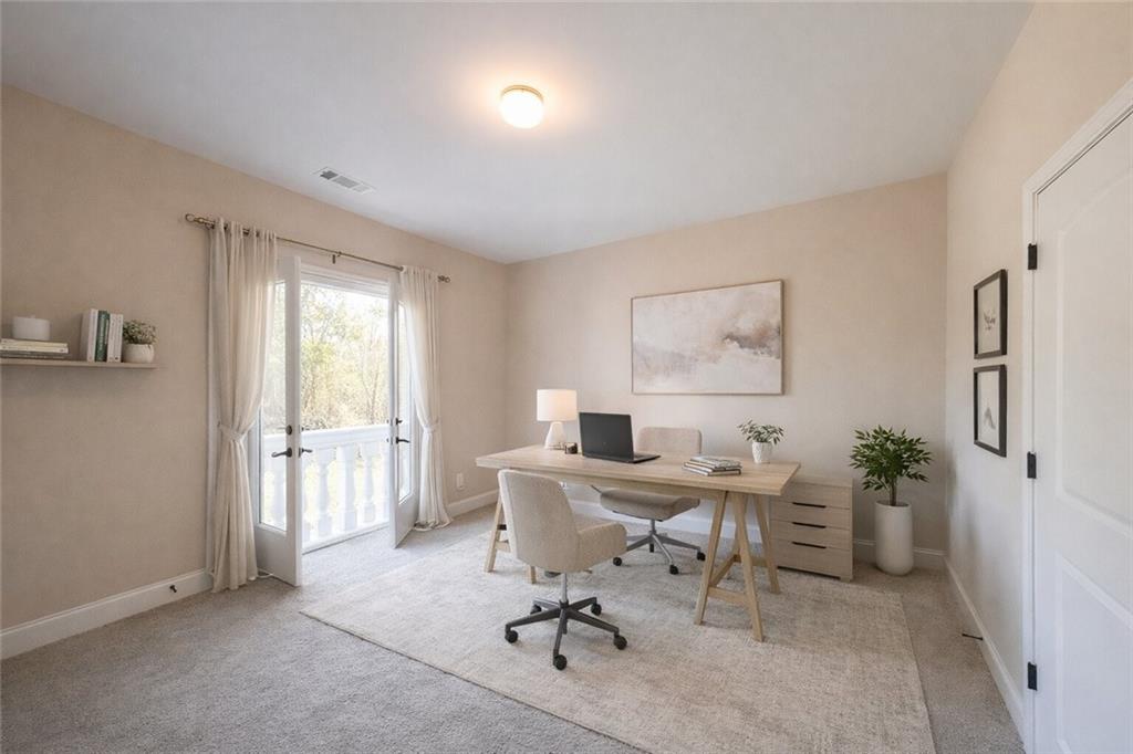 2425 Wild Oak Court Stockbridge, GA 30281 - Photo 19 of 32 a workspace with furniture and a window