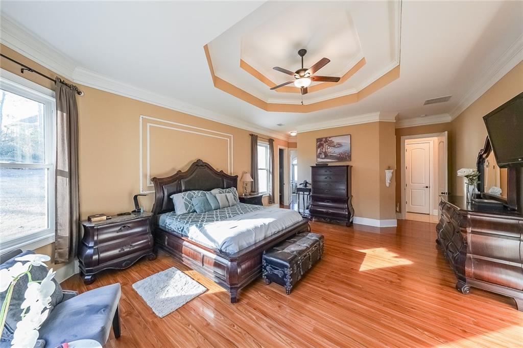 2425 Wild Oak Court Stockbridge, GA 30281 - Photo 25 of 39 a living room with furniture and a wooden floor