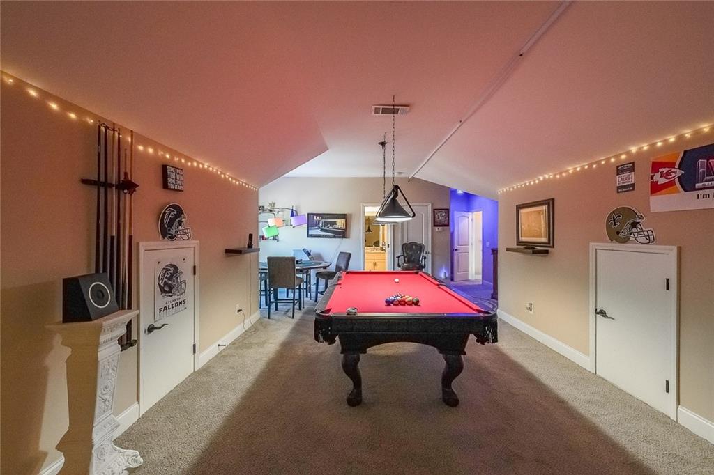 2425 Wild Oak Court Stockbridge, GA 30281 - Photo 32 of 39 a room with furniture and air hockey table