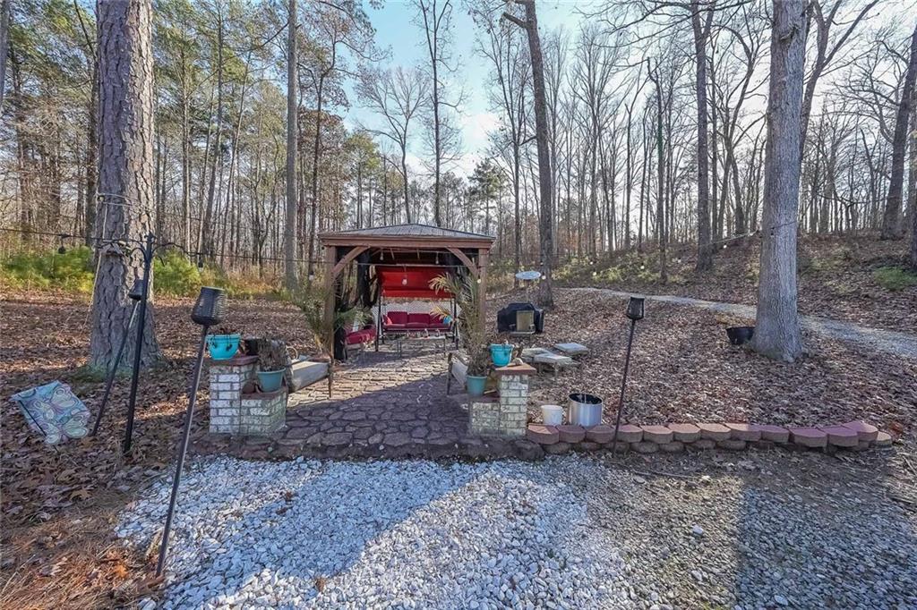 2425 Wild Oak Court Stockbridge, GA 30281 - Photo 36 of 39 a backyard of a house with barbeque oven