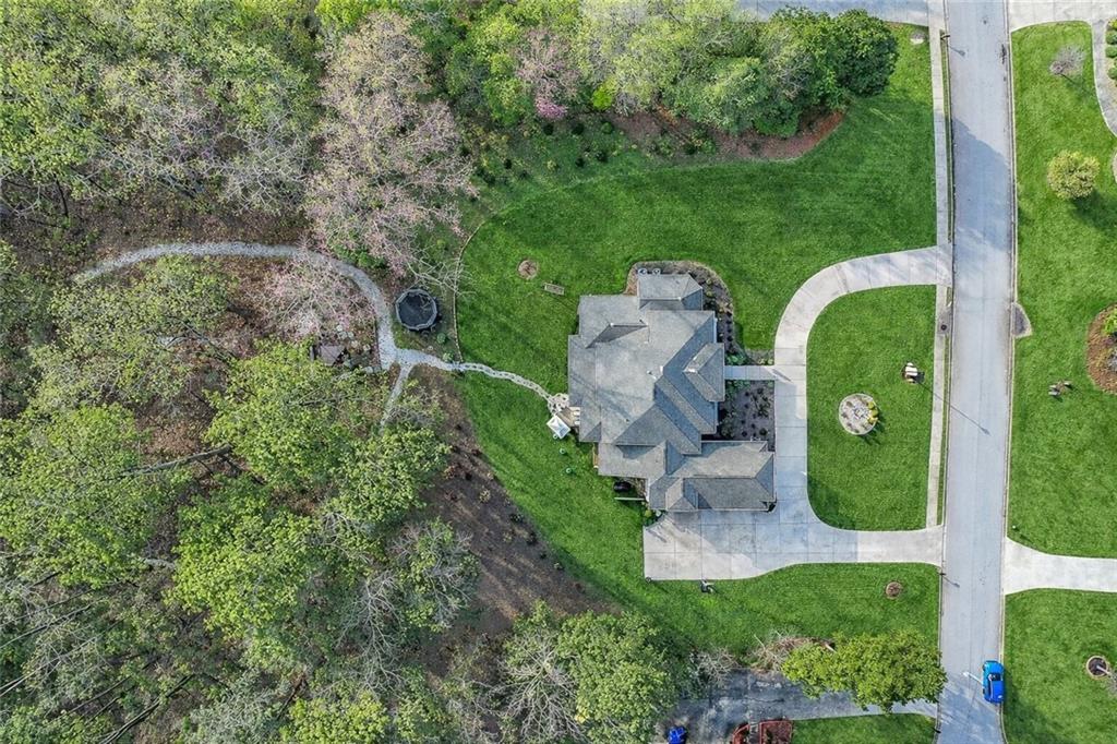 2425 Wild Oak Court Stockbridge, GA 30281 - Photo 4 of 32 an aerial view of a house with outdoor space pool seating area and yard