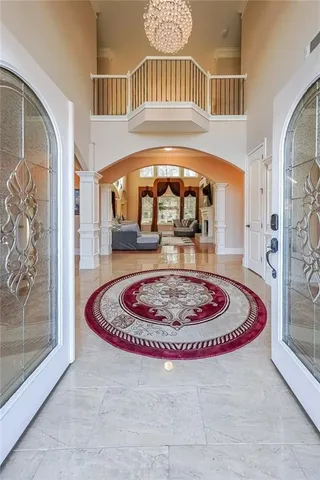 a view of a living room and a chandelier