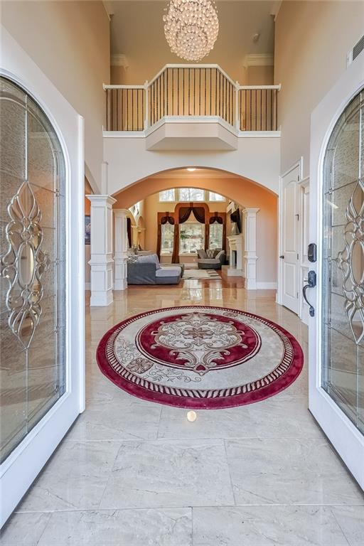 2425 Wild Oak Court Stockbridge, GA 30281 - Photo 7 of 39 a view of a living room and a chandelier