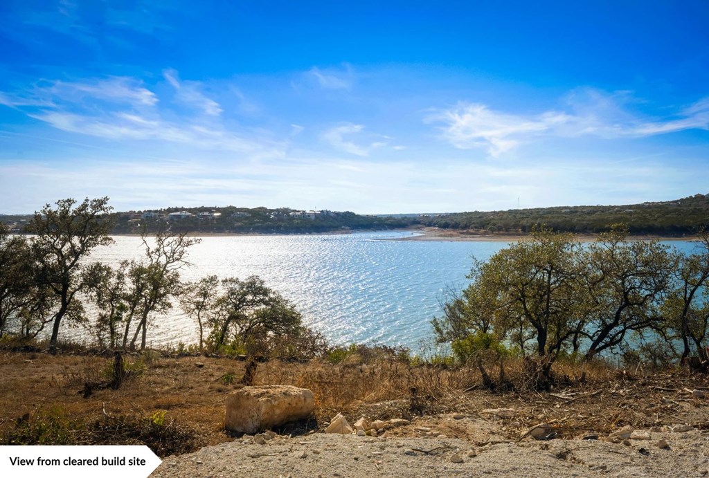 8007 Sharon Road, Unit 10 6 Leander, TX 78641 - Photo 10 of 24 a view of a lake with a yard
