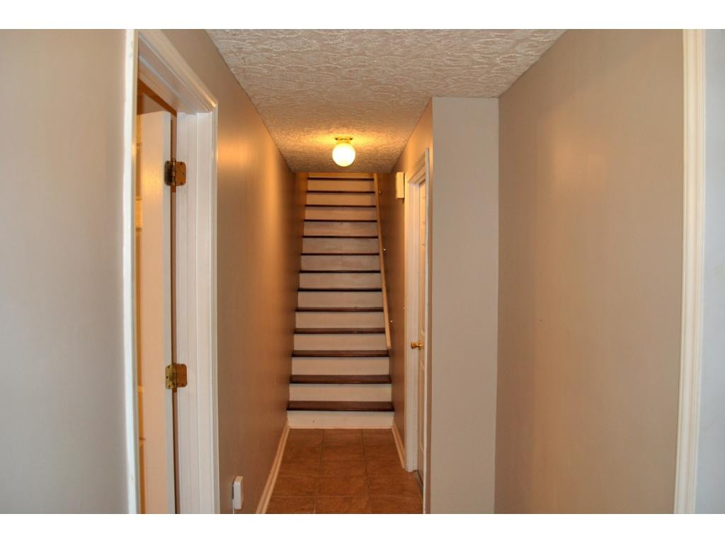 712 Bell Ridge Road Kingsport, TN 37665 - Photo 22 of 33 WOODEN STAIRCASE TO BASEMENT