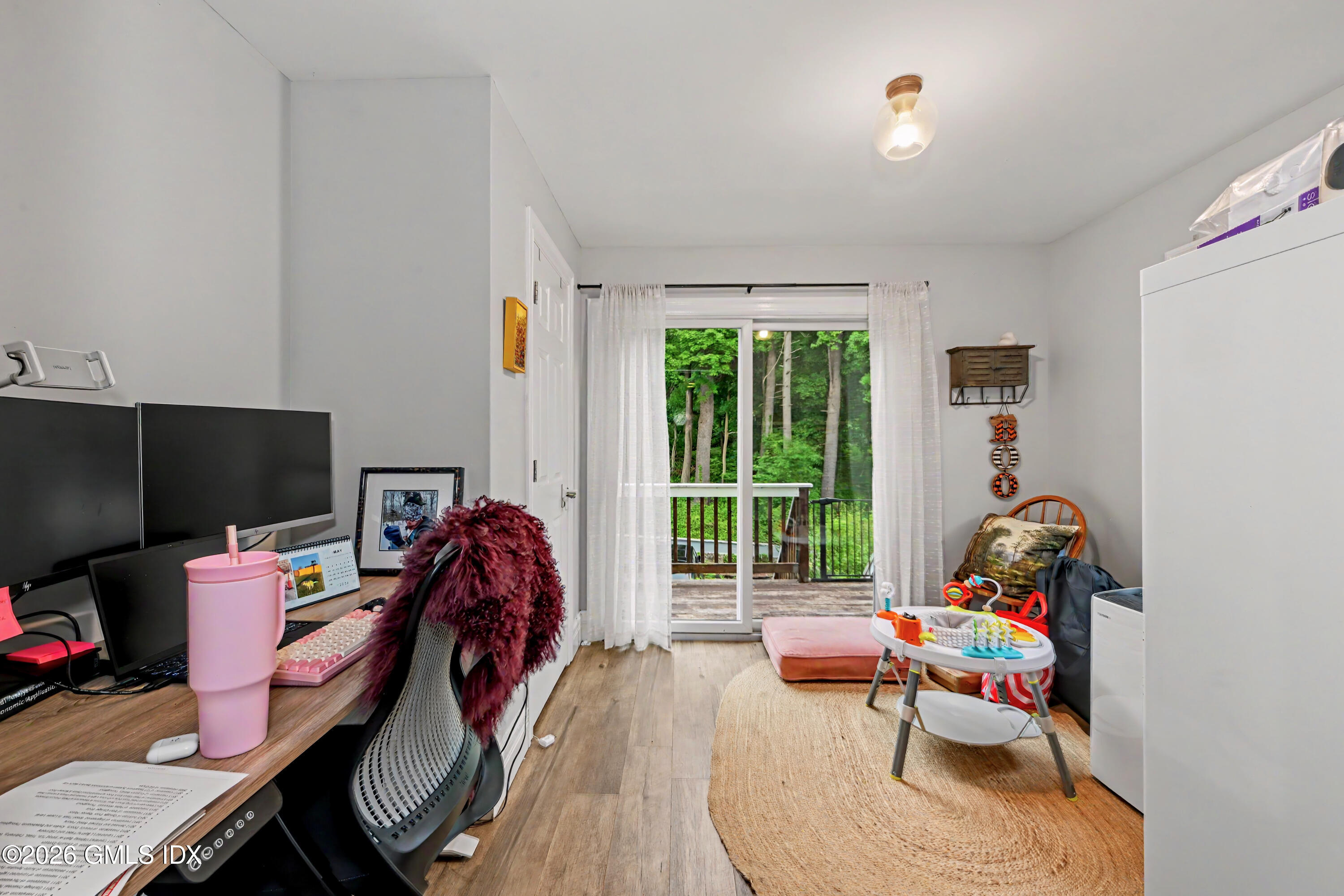 37 Prospect Street Greenwich, CT 06830 - Photo 23 of 41 a living room with furniture and a window